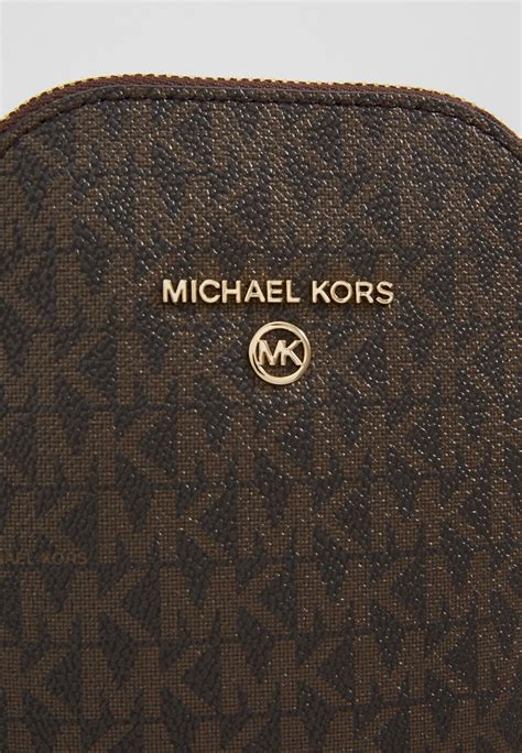 fake vs real michael kors jet set wallet|michael kors oversized wallet.